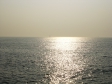 水平線に沈む夕日が反射した写真素材02